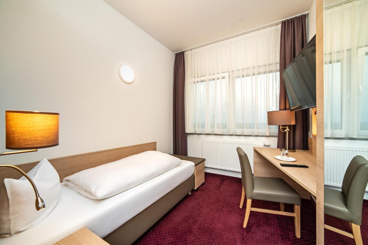Hotel Am Stadtrand Остфильдерн Экстерьер фото